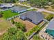 Aerial view of the home, backyard, and landscaping shows the lot size and neighborhood setting at 4624 Caribou Ave, North Port, FL 34287