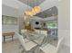 Well-lit dining area adjacent to the living room, perfect for formal meals and gatherings at 4624 Caribou Ave, North Port, FL 34287