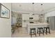 Well-equipped kitchen with modern appliances, a center island, and a cozy breakfast nook at 4624 Caribou Ave, North Port, FL 34287