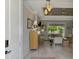 Bright and airy living room with neutral decor, wood floors, and recessed lighting throughout at 4624 Caribou Ave, North Port, FL 34287