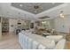 Open-concept living area with views into the kitchen and dining room, creating a spacious and inviting atmosphere at 4624 Caribou Ave, North Port, FL 34287