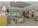 Open floor plan living room featuring light flooring, recessed lighting, and natural light at 4624 Caribou Ave, North Port, FL 34287