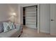 Organized walk-in closet featuring shelving and space for hanging clothes at 515 Sawgrass Bridge Rd, Venice, FL 34292