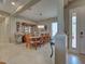 Another view of the dining room shows the size and access to the front entry at 515 Sawgrass Bridge Rd, Venice, FL 34292