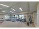 Community gym featuring modern cardio equipment, ceiling fans, and multiple TV screens at 515 Sawgrass Bridge Rd, Venice, FL 34292