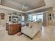 Comfortable living room featuring stylish decor and access to the patio through sliding glass doors at 515 Sawgrass Bridge Rd, Venice, FL 34292