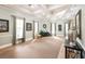 Bright lobby with beautiful architectural details and ample natural light from large windows at 515 Sawgrass Bridge Rd, Venice, FL 34292
