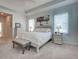 Another view of the main bedroom with a large dresser and decorations at 515 Sawgrass Bridge Rd, Venice, FL 34292