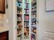 Pantry stocked with storage shelving and multiple canned and boxed food items at 515 Sawgrass Bridge Rd, Venice, FL 34292