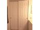 Bathroom closet with sliding doors and convenient built-in storage at 542 Walnut Cir, Venice, FL 34285