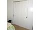 Bedroom closet with sliding doors, offering convenient storage at 542 Walnut Cir, Venice, FL 34285