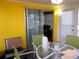 Sunroom showing sliding glass doors and open view of the adjacent sunroom at 542 Walnut Cir, Venice, FL 34285