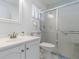 Clean, well-lit bathroom with a glass-enclosed shower and modern fixtures at 5559 Brassy Loop, North Port, FL 34287