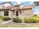 Home with landscaped front yard and inviting facade at 5559 Brassy Loop # 5559, North Port, FL 34287