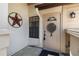 Inviting front entrance with decorative details, enhancing curb appeal and charm at 5559 Brassy Loop # 5559, North Port, FL 34287