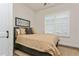 Tranquil bedroom with shuttered windows and comfortable decor creating a peaceful ambiance at 5581 Piccolo St, Nokomis, FL 34275
