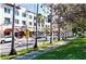 Charming street view with lush greenery and attractive buildings lining the sidewalk at 5581 Piccolo St, Nokomis, FL 34275