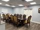Well-lit conference room featuring a large table and comfortable seating at 5668 Holiday Park Blvd, North Port, FL 34287