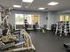 Well-equipped gym with multiple machines, free weights, and a mirrored wall for fitness enthusiasts at 5668 Holiday Park Blvd, North Port, FL 34287