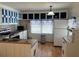 Traditional kitchen equipped with essential appliances, and ample storage at 5668 Holiday Park Blvd, North Port, FL 34287