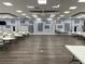 Spacious meeting room with tables and chairs, ideal for community events at 5668 Holiday Park Blvd, North Port, FL 34287