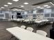 Spacious meeting room with tables and chairs, providing a functional space for gatherings at 5668 Holiday Park Blvd, North Port, FL 34287