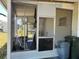 Enclosed screen porch that needs minor repairs at 5668 Holiday Park Blvd, North Port, FL 34287