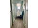 Bathroom featuring a glass-enclosed shower, single vanity, and nautical decor at 603 Leisure, Venice, FL 34285