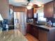 Modern kitchen with stainless steel appliances and granite countertops at 603 Leisure, Venice, FL 34285