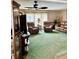 Inviting living room with plush seating, ceiling fan, and natural light at 603 Leisure, Venice, FL 34285