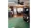 Open living room with a fireplace and dining area at 603 Leisure, Venice, FL 34285