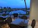 Scenic patio view overlooking the marina, perfect for outdoor dining and relaxation at 603 Leisure, Venice, FL 34285