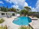 Inviting backyard with a sparkling pool, patio, perfect for outdoor relaxation and entertaining at 607 Bay Point Ave, Nokomis, FL 34275