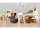 Spacious living room features high ceilings, tile floors, and an abundance of natural light at 6293 Taneytown St, North Port, FL 34291