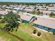 Aerial view of the neighborhood with beautiful landscaping and well-maintained homes at 657 Foxwood Blvd, Englewood, FL 34223