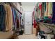 Organized walk-in closet with shelving, hanging racks, and plenty of storage at 657 Foxwood Blvd, Englewood, FL 34223