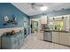 Bright kitchen with modern appliances and a view to the living room at 657 Foxwood Blvd, Englewood, FL 34223