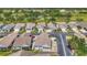 Scenic aerial view of Ironwood Villas community near the golf course and pond at 710 Ironwood Dr # 165, Venice, FL 34292