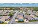 This is an aerial view of a cozy single-story home in a charming neighborhood with well-maintained streets at 710 Ironwood Dr # 165, Venice, FL 34292
