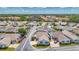 This is an aerial view of a cozy single-story home in a charming neighborhood with well-maintained streets at 710 Ironwood Dr # 165, Venice, FL 34292