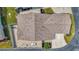 Aerial view of the backyard featuring an outdoor patio and pavers at 710 Ironwood Dr # 165, Venice, FL 34292