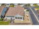 Outdoor patio with brick pavers, charming outdoor furniture, and privacy fence at 710 Ironwood Dr # 165, Venice, FL 34292