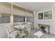 Cozy sunroom with multiple windows and views at 710 Ironwood Dr # 165, Venice, FL 34292