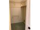 An empty walk-in closet with shelving and carpeted floor at 744 Avenida Estancia # 142, Venice, FL 34292