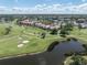 Community of condos with golf course and pond at 758 Village Cir # 106, Venice, FL 34292