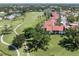 Scenic aerial view of back of condo overlooking a golf course at 758 Village Cir # 106, Venice, FL 34292