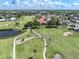 Scenic aerial of community and golf course on a clear, sunny day at 758 Village Cir # 106, Venice, FL 34292