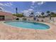 Community pool with surrounding patio, seating and landscaping at 758 Village Cir # 106, Venice, FL 34292