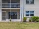 Ground floor exterior of building showing patio at 758 Village Cir # 106, Venice, FL 34292
