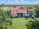 Condo with screened in patios overlooking well-manicured lawn at 758 Village Cir # 106, Venice, FL 34292